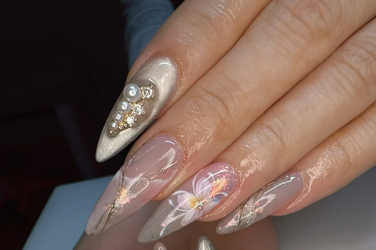 Custom floral Gel X nail extensions representing nail art content for local salon SEO